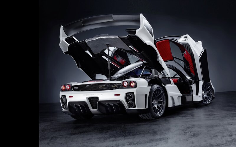 white sports car with open doors