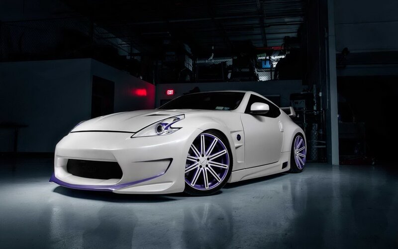 white sports car with purple accents