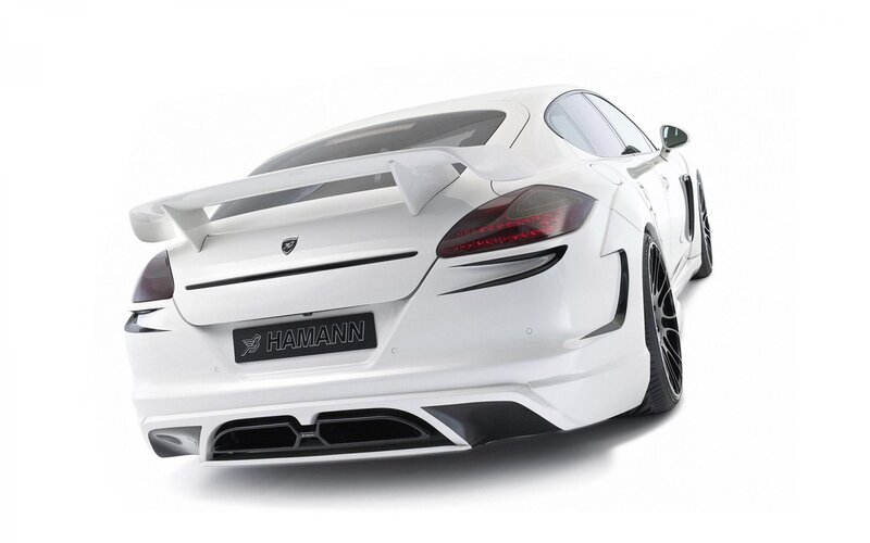 white sports car with rear spoiler