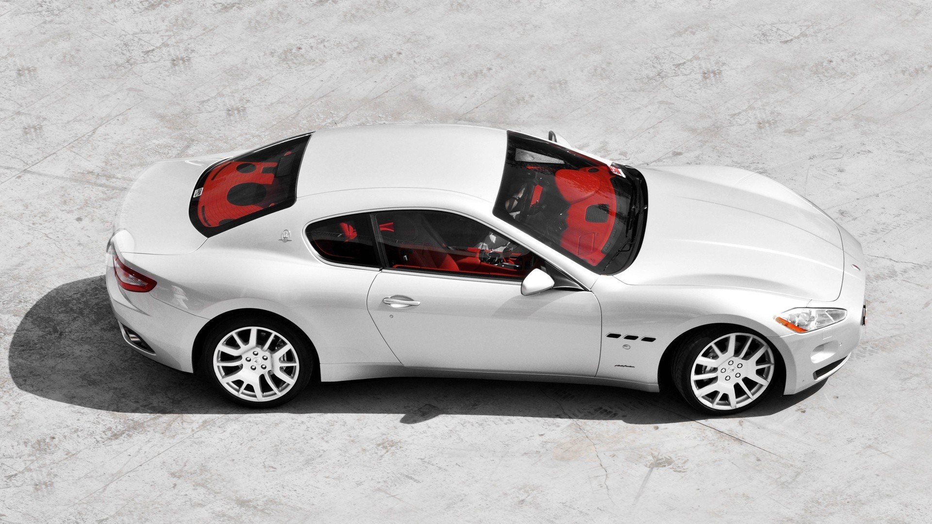 white sports car with red interior