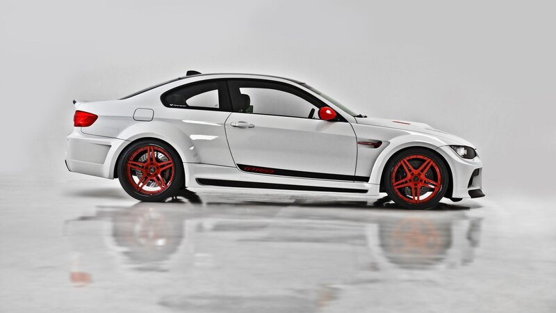 white sports car with red wheels