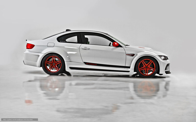white sports car with red wheels