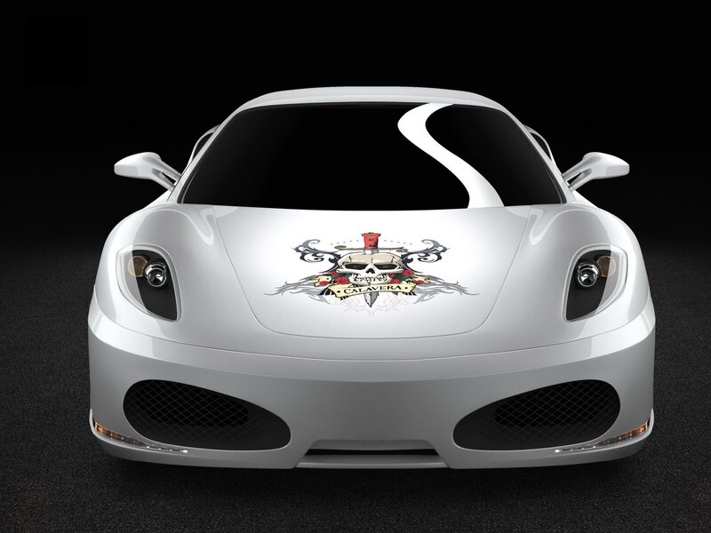 white sports car with skull decal