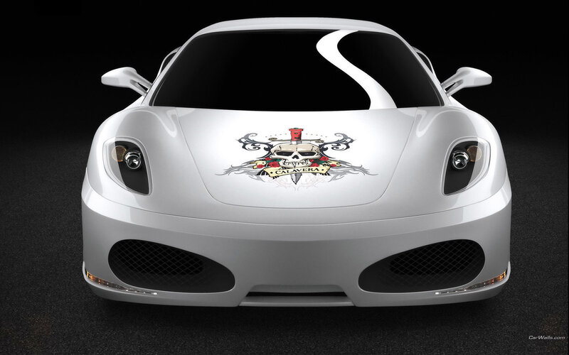 white sports car with skull design