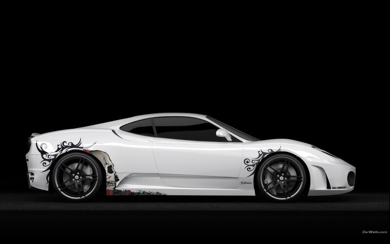 white sports car with skull design