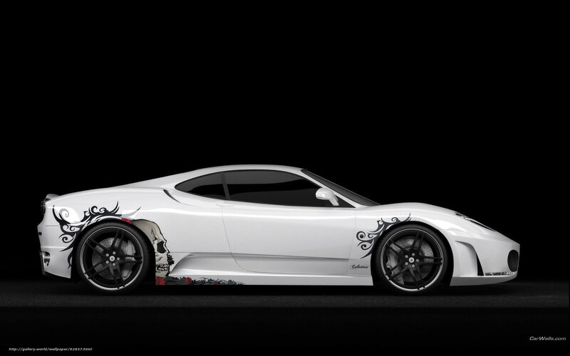 white sports car with tribal design