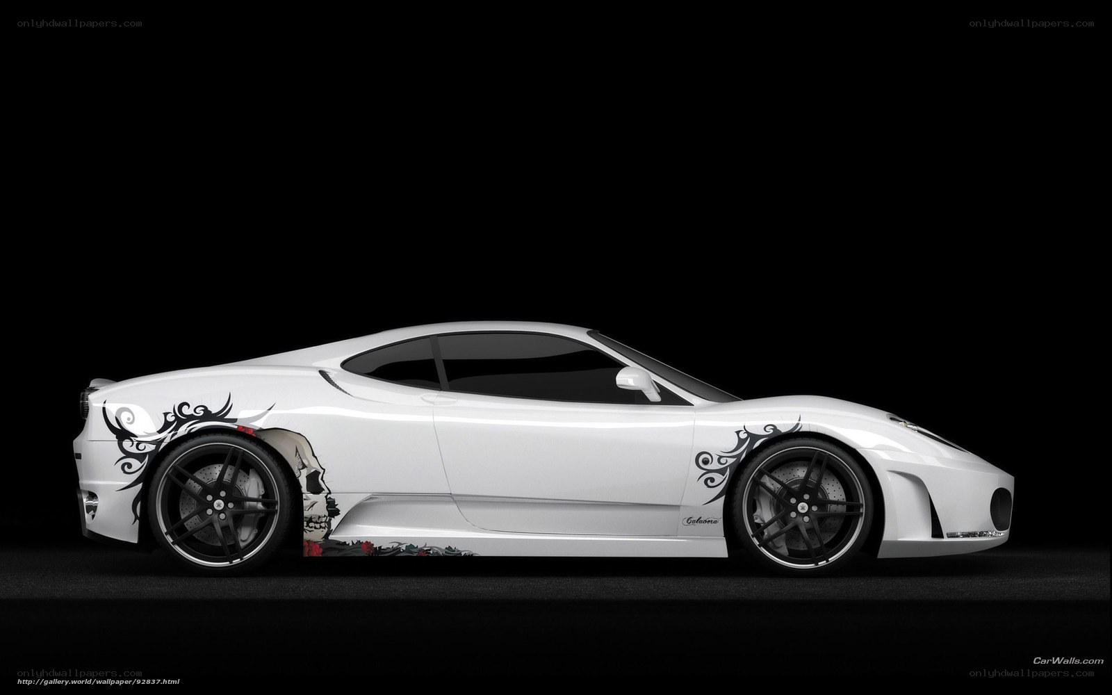 white sports car with tribal design
