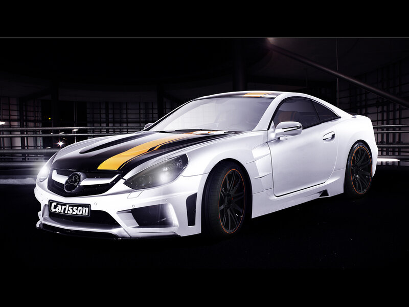 White sports car with yellow stripes