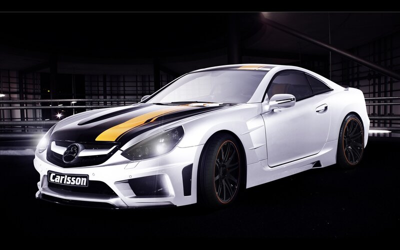 White sports car with yellow stripes