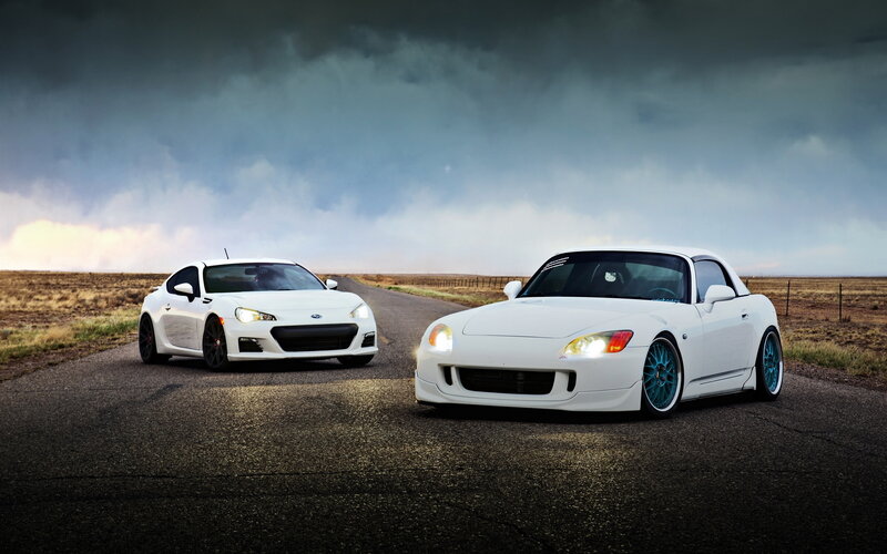 White Sports Cars — Dramatic, Sunset