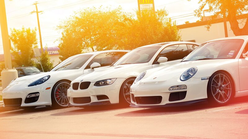 White sports cars in a row