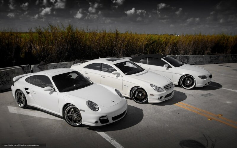 White sports cars in a row