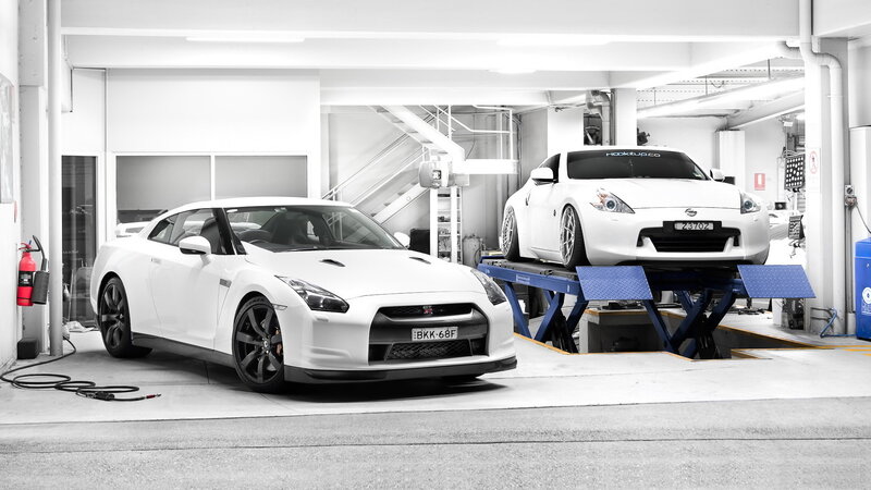 White Sports Cars in Garage — Industrial