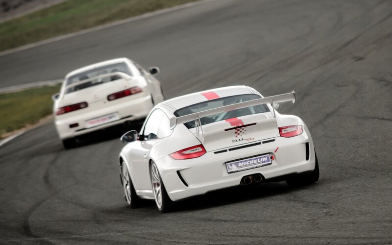 White Sports Cars on Track — Dynamic