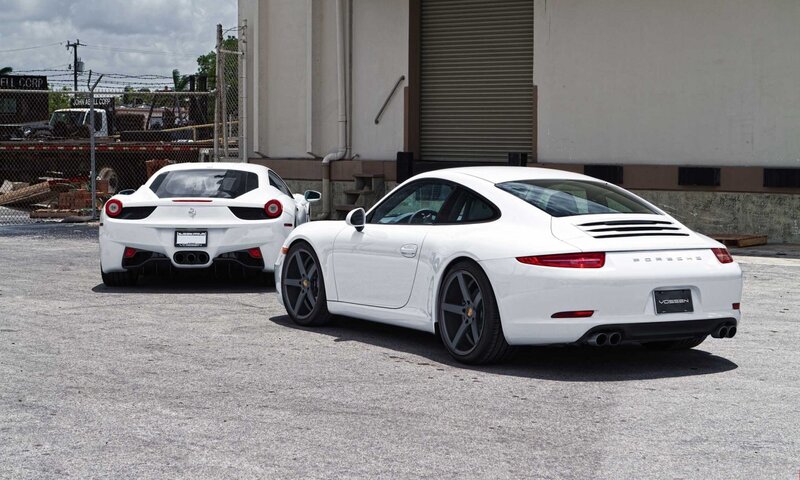 White sports cars parked