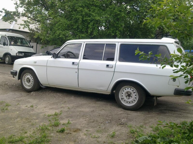 white station wagon parked outside