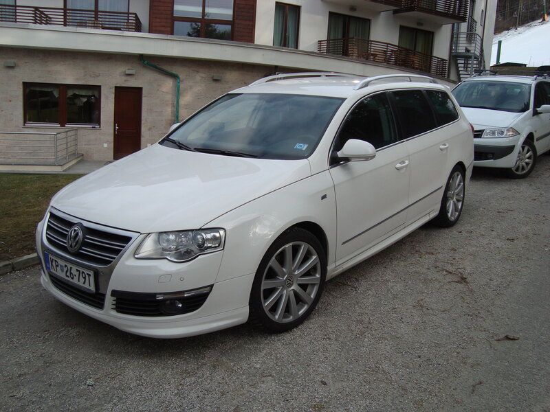 white station wagon parked outside