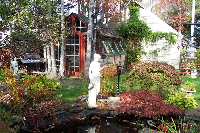 White Statue in Garden — Green