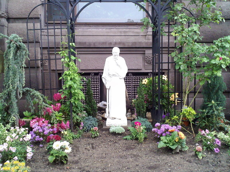 White Statue in Garden