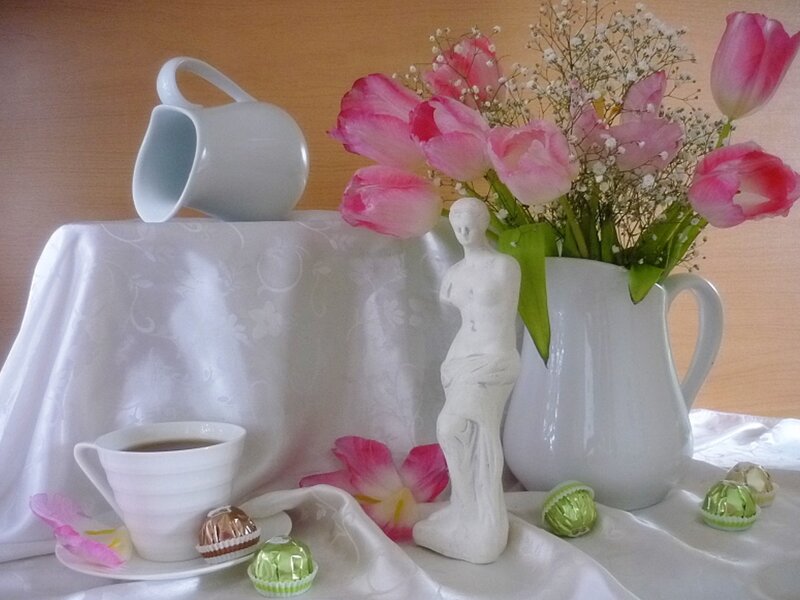 White Statue with Flowers