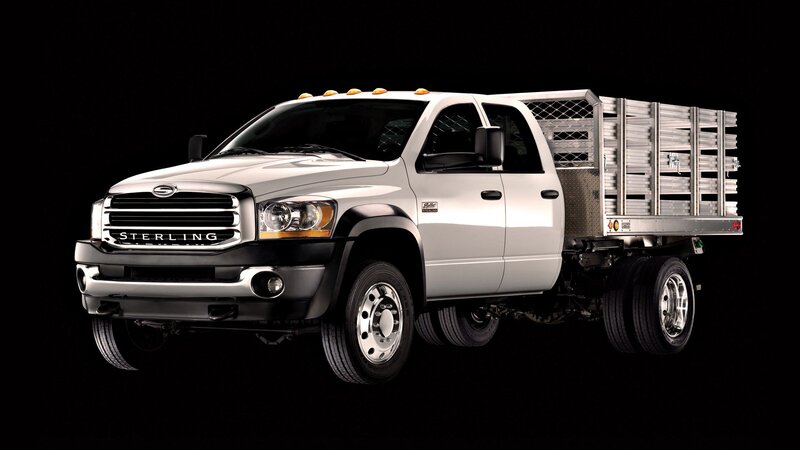 white Sterling truck with flatbed