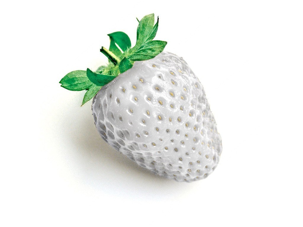 white strawberry with green leaves