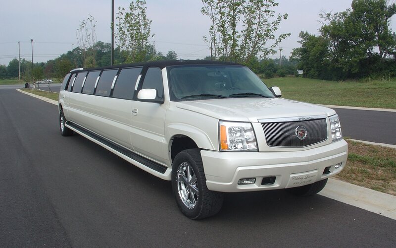 white stretch limousine on road