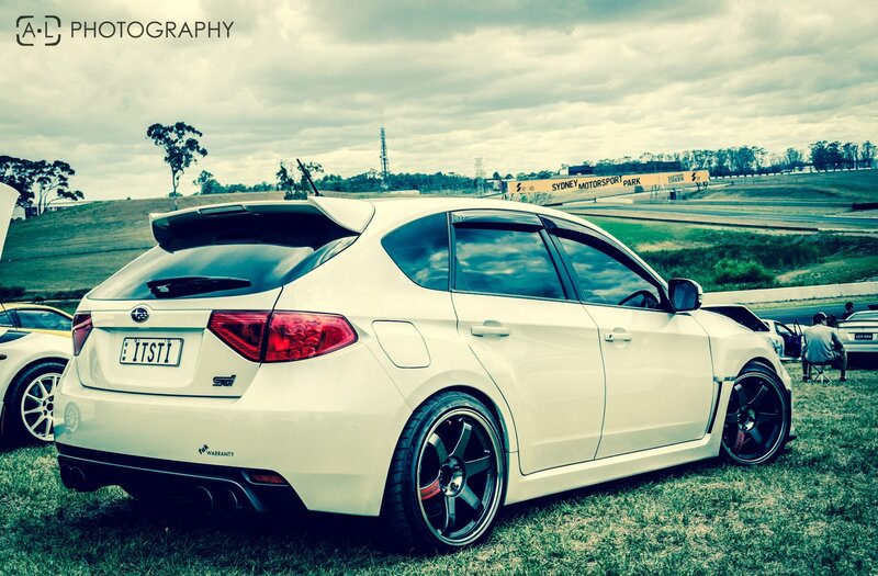 White Subaru at motorsport park