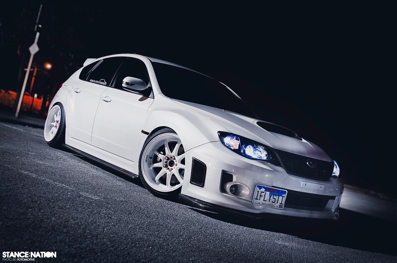 white subaru at night