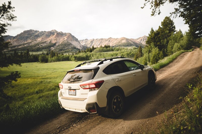 White Subaru Car — Green