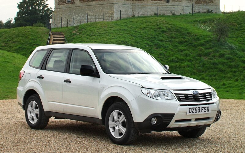 white subaru forester suv