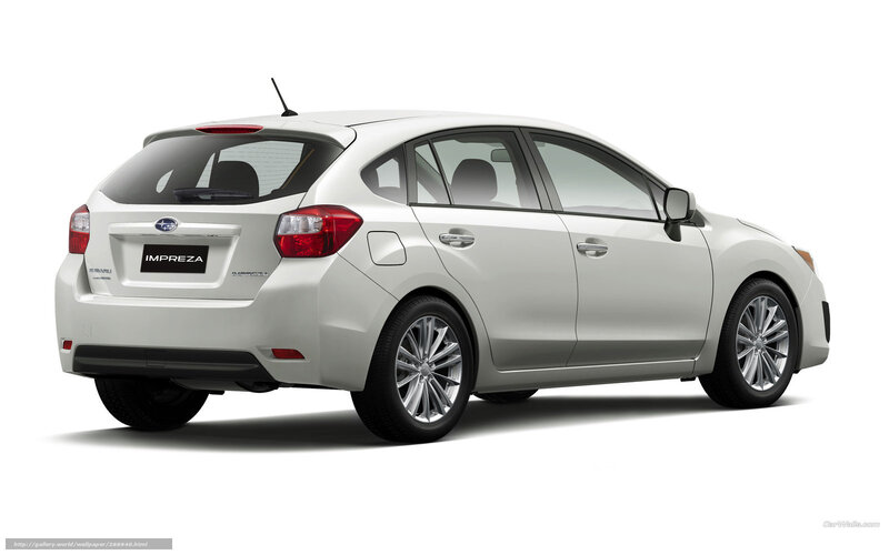 White Subaru Impreza hatchback
