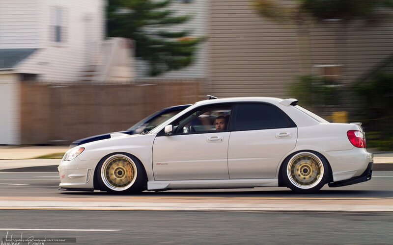 white subaru in motion