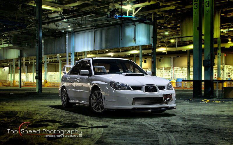 White Subaru in warehouse