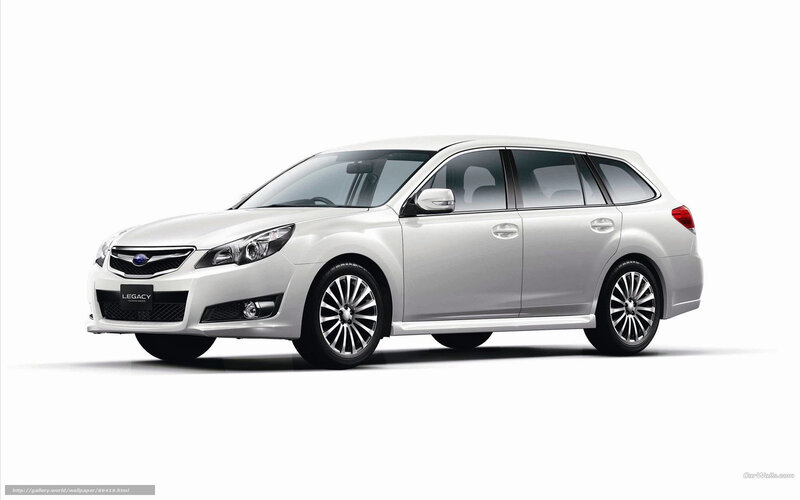 white subaru legacy station wagon