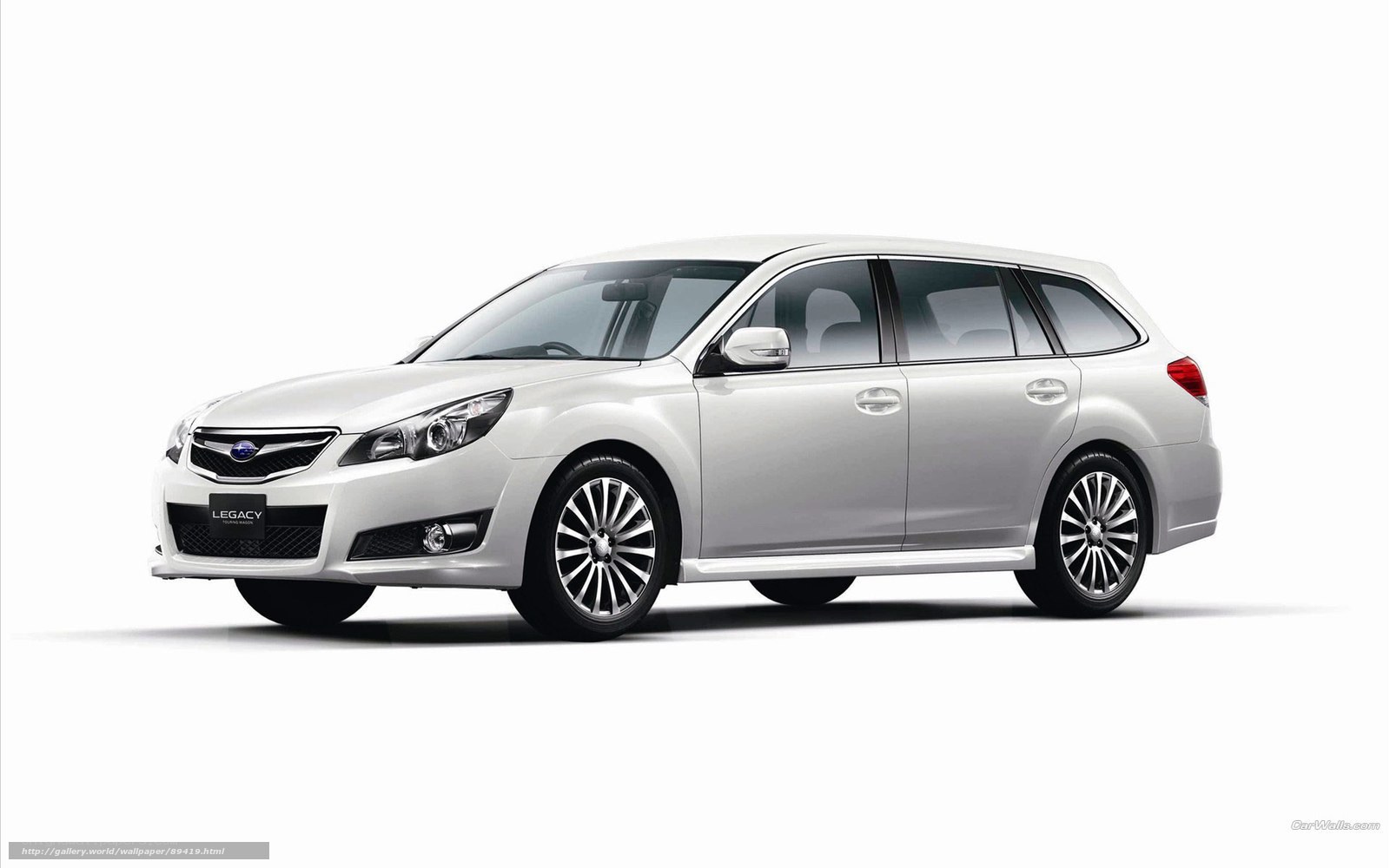 white subaru legacy station wagon