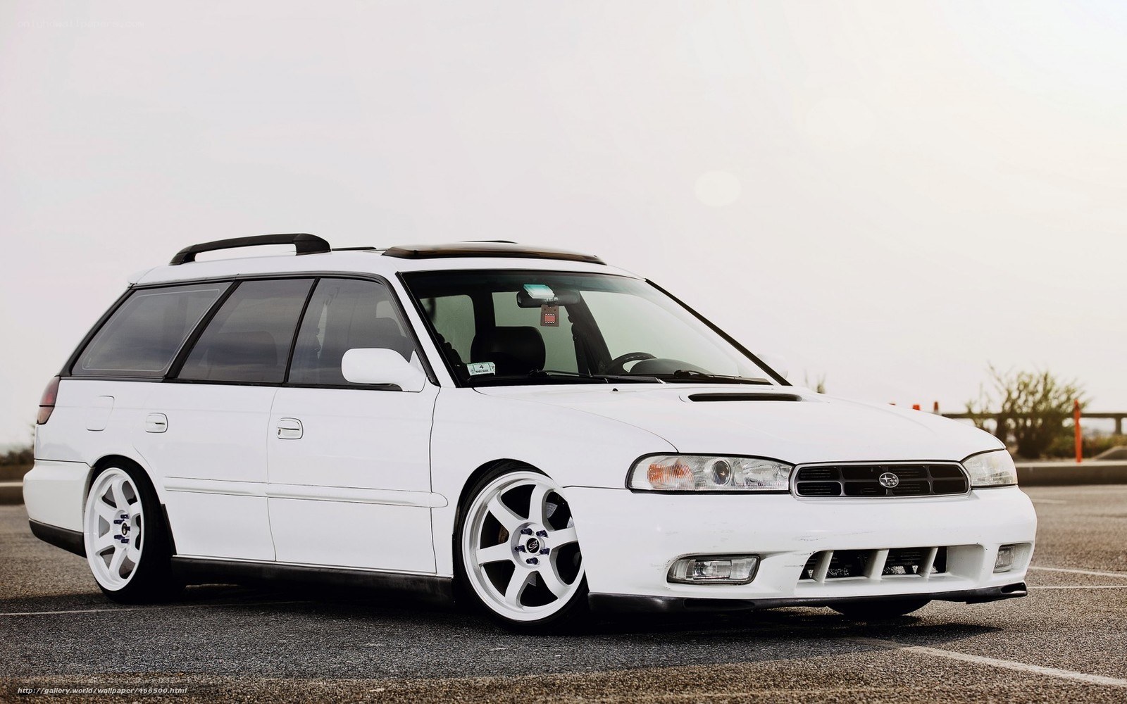 white subaru station wagon