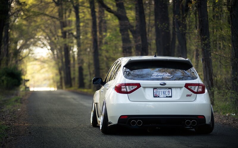 White Subaru Sti Car — Serene