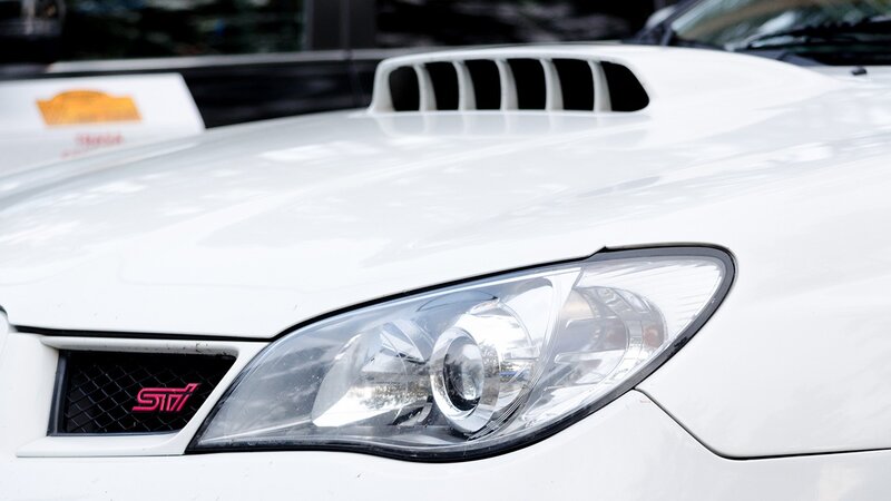 white subaru sti front view