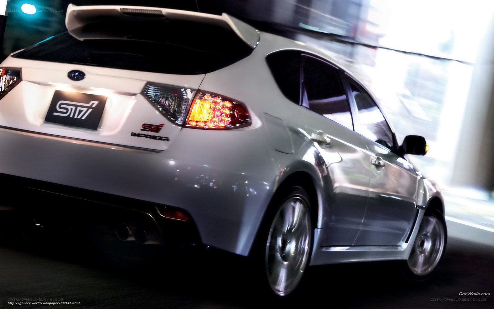 White Subaru STI in motion