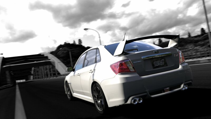 white subaru sti on track
