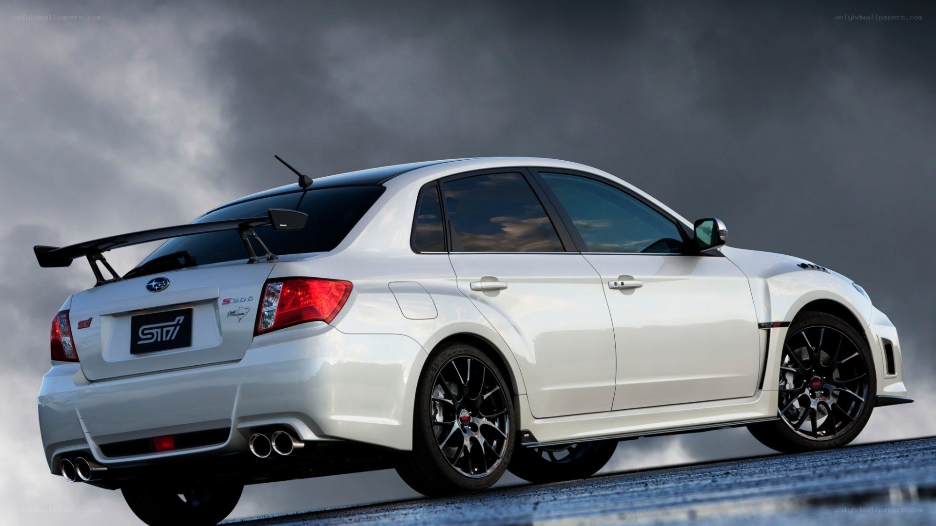 white subaru sti sedan