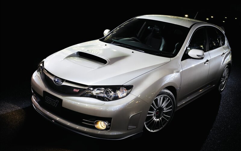 white subaru sti sports car