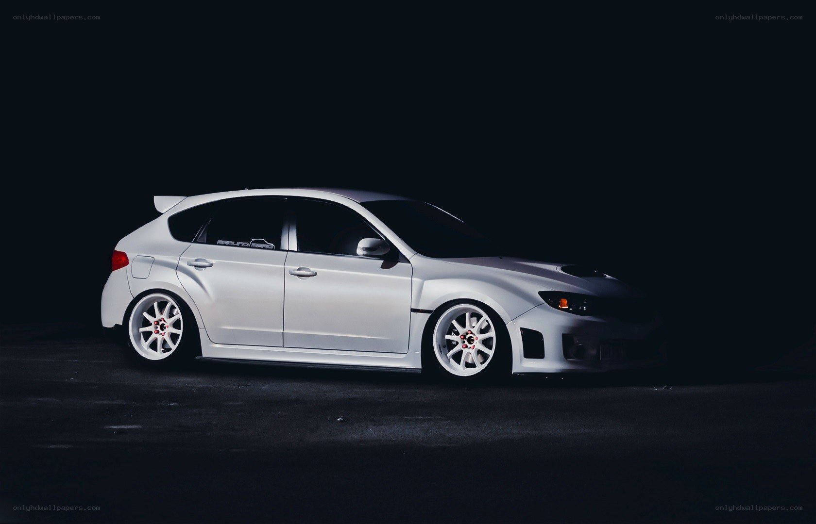 white subaru wrx hatchback