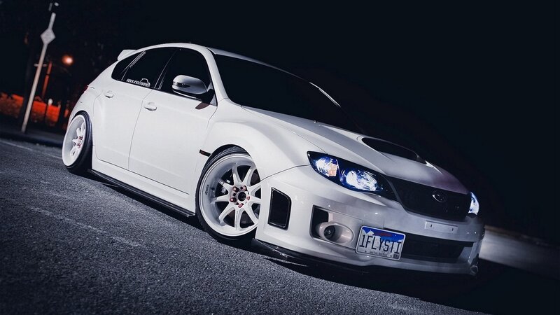 white subaru wrx sti at night
