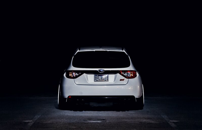 white subaru wrx sti at night