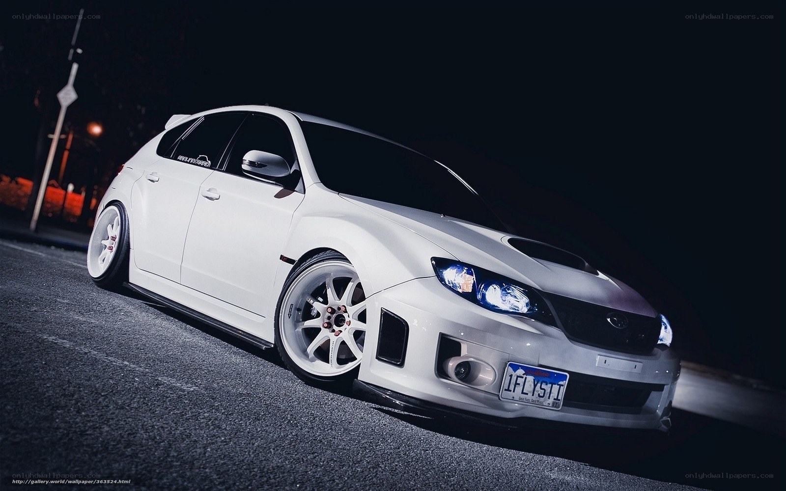white subaru wrx sti at night