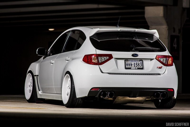 white subaru wrx sti hatchback