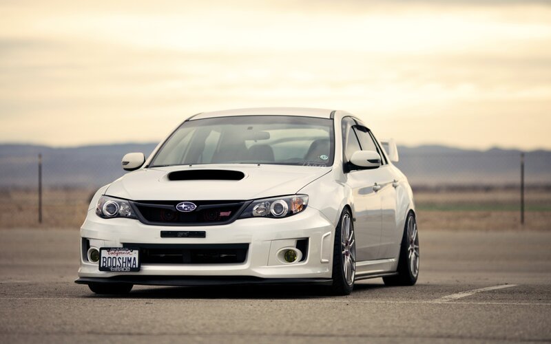 white subaru wrx sti on track