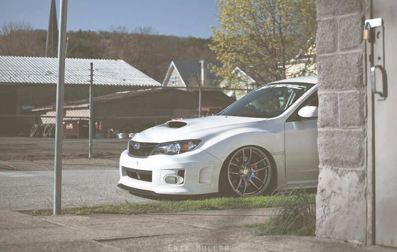 white subaru wrx sti parked